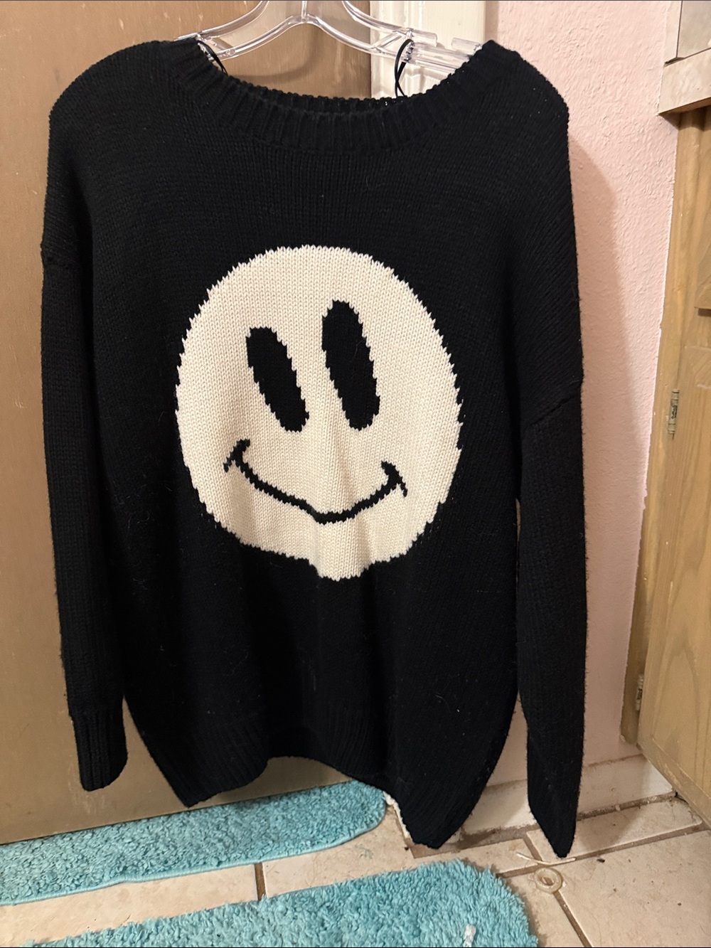 Black Crewneck Sweater with Cream Smiley Graphic